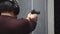 Man shooting with a pistol