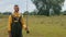 Man with short hair and beard, with fishing rod in his hands, a fisherman posing