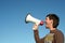 Man Shouting Through Megaphone