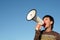 Man Shouting Through Megaphone