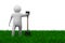 Man with shovel on grass