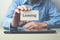 Man showing word leasing on the business card.