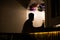 Man silhouette in cafe bar drink alcoholic drinks