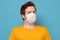 Man with single use medical mask to prevent infection disease such as flu