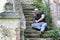Man sit on abandoned stair