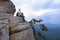 Man sits on the cliff in Crimea