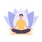 A man sits in a padmasana pose and meditates