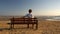 Man sitting alone on the beach