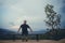 Man sitting alone on bench looking at view