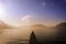 Man sitting on Annecy lake pontoon