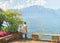 Man sitting on bench embankment of Geneva Lake Montreux summer