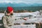 Man sitting on bench enjoying sea and mountains landscape Traveling alone Lifestyle