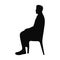 Man sitting on a chair silhouette