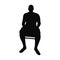 Man sitting on a chair silhouette vector