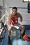 Man sitting in corner of boxing ring