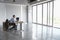 Man Sitting At Desk In Empty Office