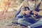 Man sitting and drinking tea  on forest camping concept