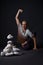 Man sitting on the floor in yoga pose studio shot