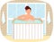 Man sitting in hot water and relaxing in home sauna. Guy is taking bath and having rest at free time