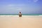 Man sitting lonely on beach