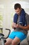 Man sitting on stationary bike