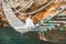 man sitting at suspension bridge enjoying sea view and nature calmness