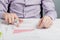 Man sitting at table looking at documents