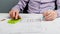 Man sitting at table looking at documents