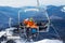 Man skier with child lift on ropeway chair