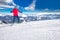 Man skiing on the prepared slope with fresh new powder snow in Alps