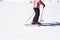 Man skiing in the snow in winter. Young man dressed in red black skiing gear. Skies at Bunderishka polyana, skiers on ski slopes,