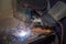 man skilled working factory welder,cutting,grinding,drill