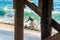 Man Skimboards During King Tide