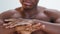 Man skincare male grooming african guy hand cream