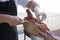 Man slicing prosciutto