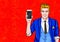 Man with smartphone in the hand in comic style.Man with phone. Man showing mobile phone.Digital advertisement. Iphone, cellphone,