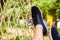 Man In Sneakers Lying In Hammock In Woods