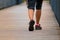 Man with sneakers running on a path, helathy activity to make exercice