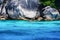 A man snorkeling in crystal seawater