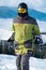 man snowboarder portrait carpathian mountains on background