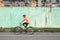 Man speeding on a bicycle with blur motion