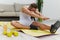 Man sport does muscle and body stretching, pumped up man fitness trainer does sports at home, the concept of health and