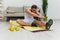 Man sport does muscle and body stretching, pumped up man fitness trainer does sports at home, the concept of health and
