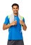 Man In Sports Clothing Holding Water Bottle And Towel