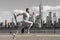 Man in sports suit training jogging. Running man in Manhattan. Morning sport workout jogger run in New York. Jogger run