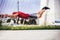 Man in sporty wear alone working out doing extreme pushups