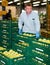 Man stacking boxes with selected apples