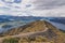 Man stand on Roy`s Peak, Wanaka, New Zealand