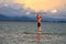 Man on stand up paddle. Water and beach sport