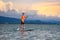 Man on stand up paddle. Water and beach sport